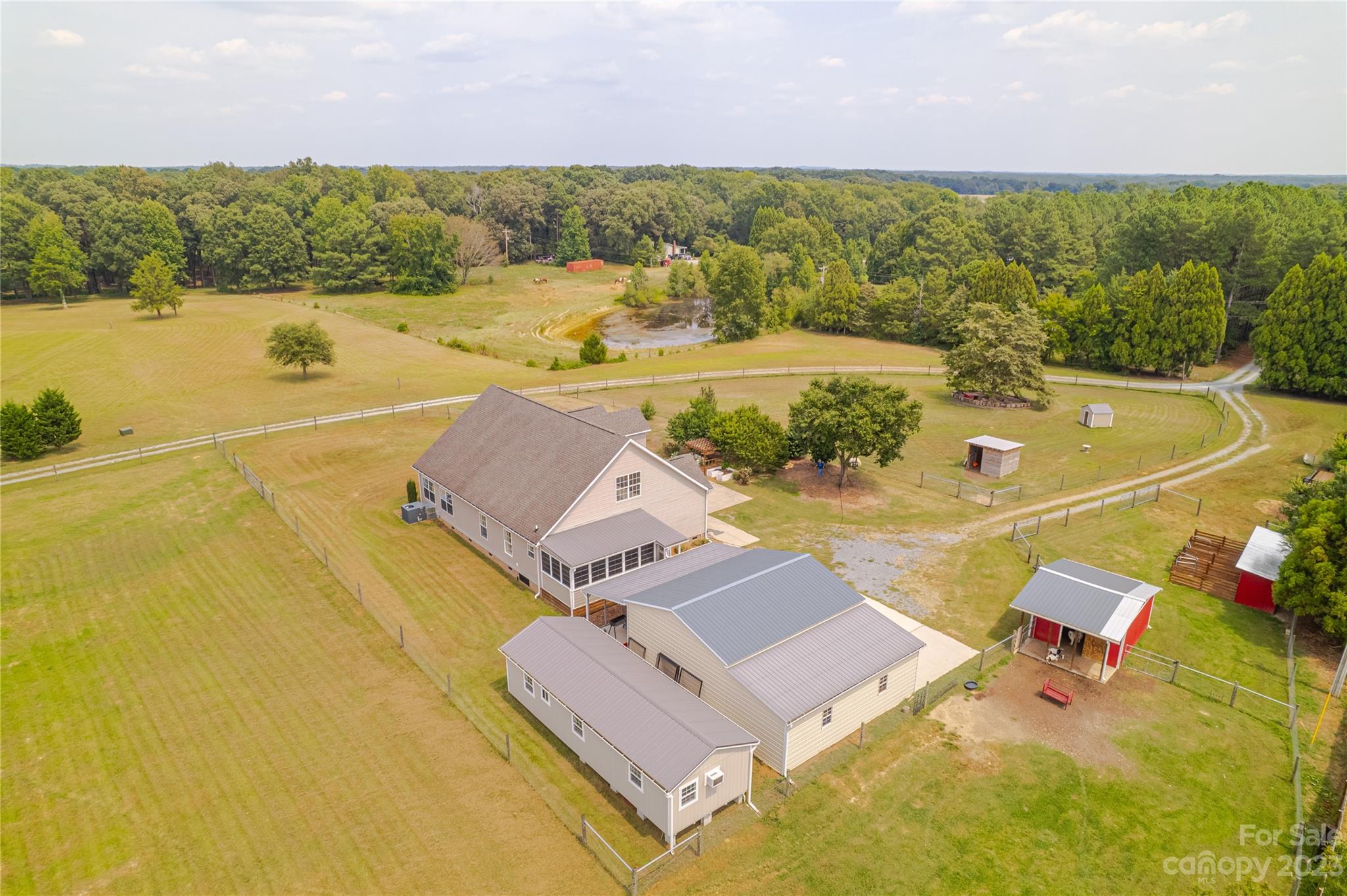 1131 Sikes Mill Road Monroe, NC 28110 - Photo 14 of 43 an aerial view of a house with a ocean view