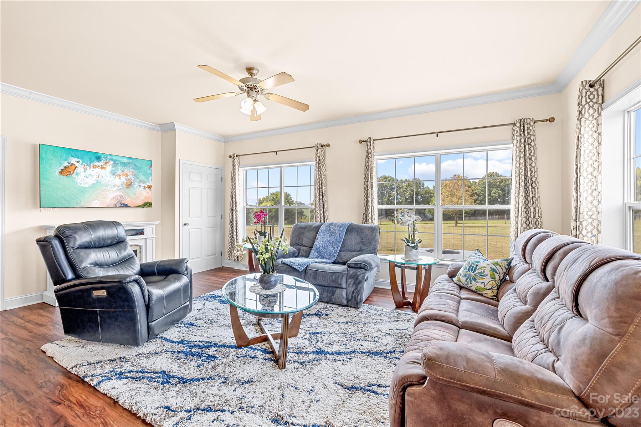 1131 Sikes Mill Road Monroe, NC 28110 - Photo 19 of 43 a living room with furniture and a large window