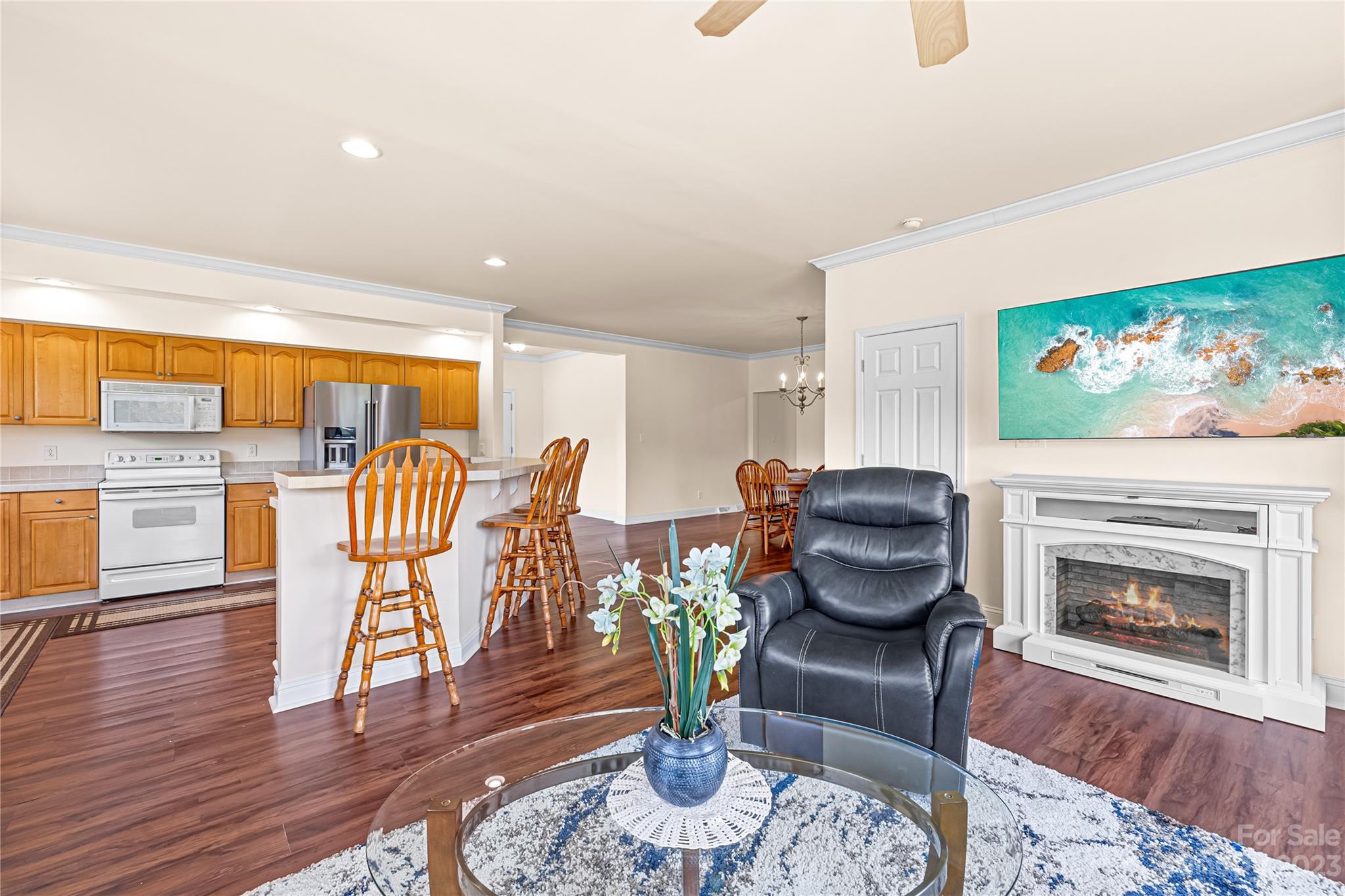 1131 Sikes Mill Road Monroe, NC 28110 - Photo 20 of 43 a living room with furniture a fireplace and next to a window