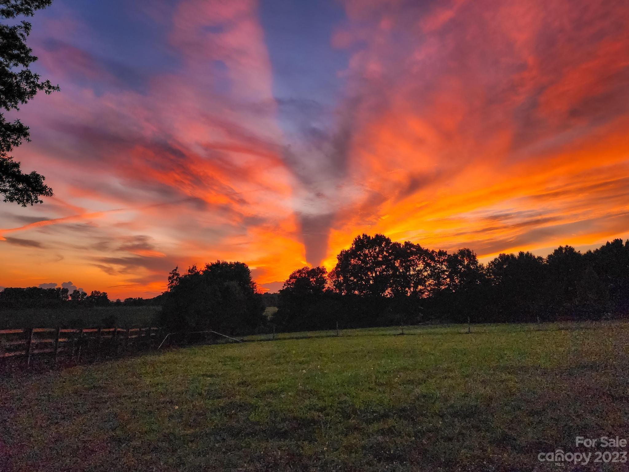 1131 Sikes Mill Road Monroe, NC 28110 - Photo 2 of 43 a view of an outdoor space and mountain view