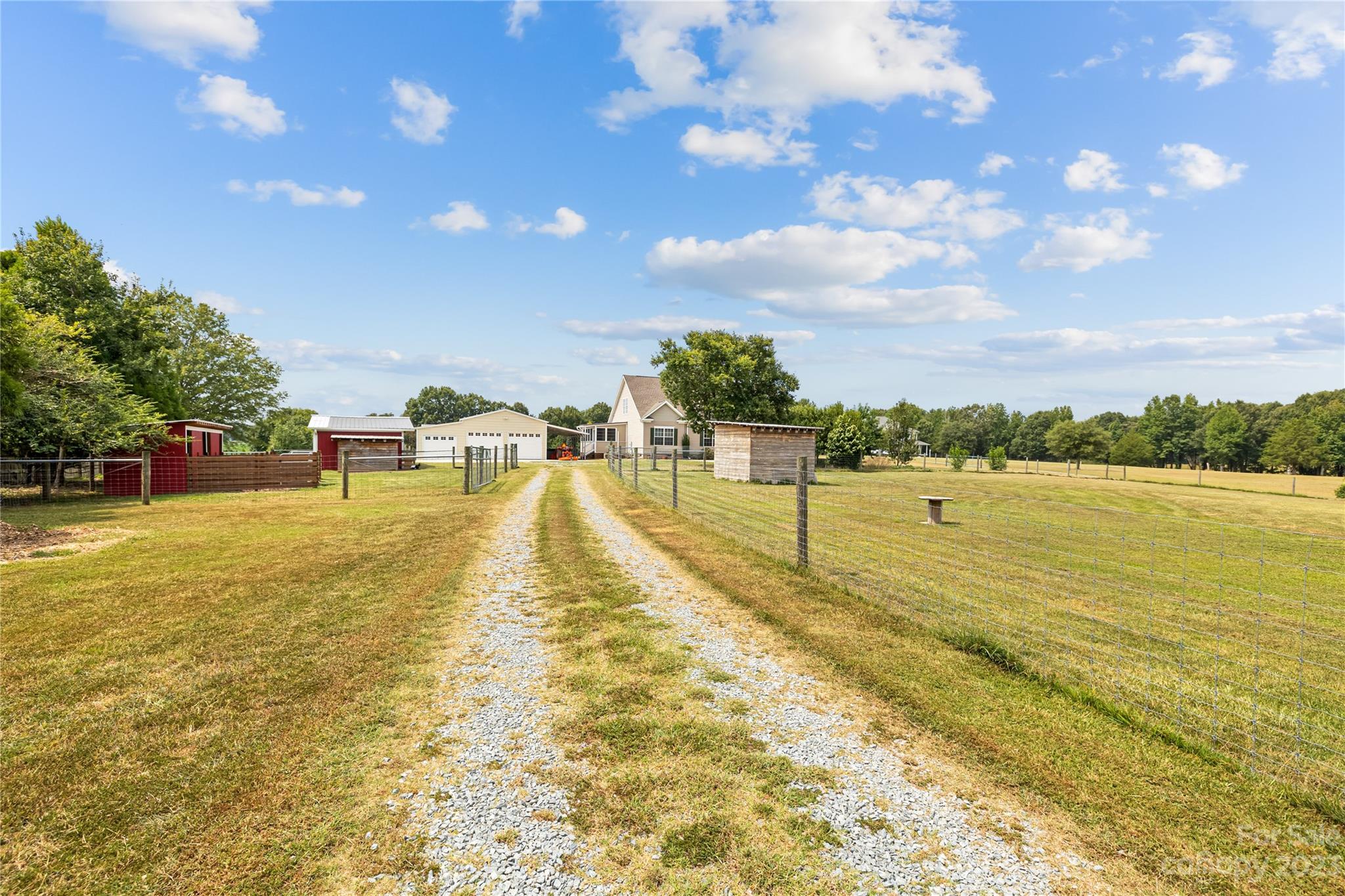 1131 Sikes Mill Road Monroe, NC 28110 - Photo 34 of 43 a view of a lake with a big yard