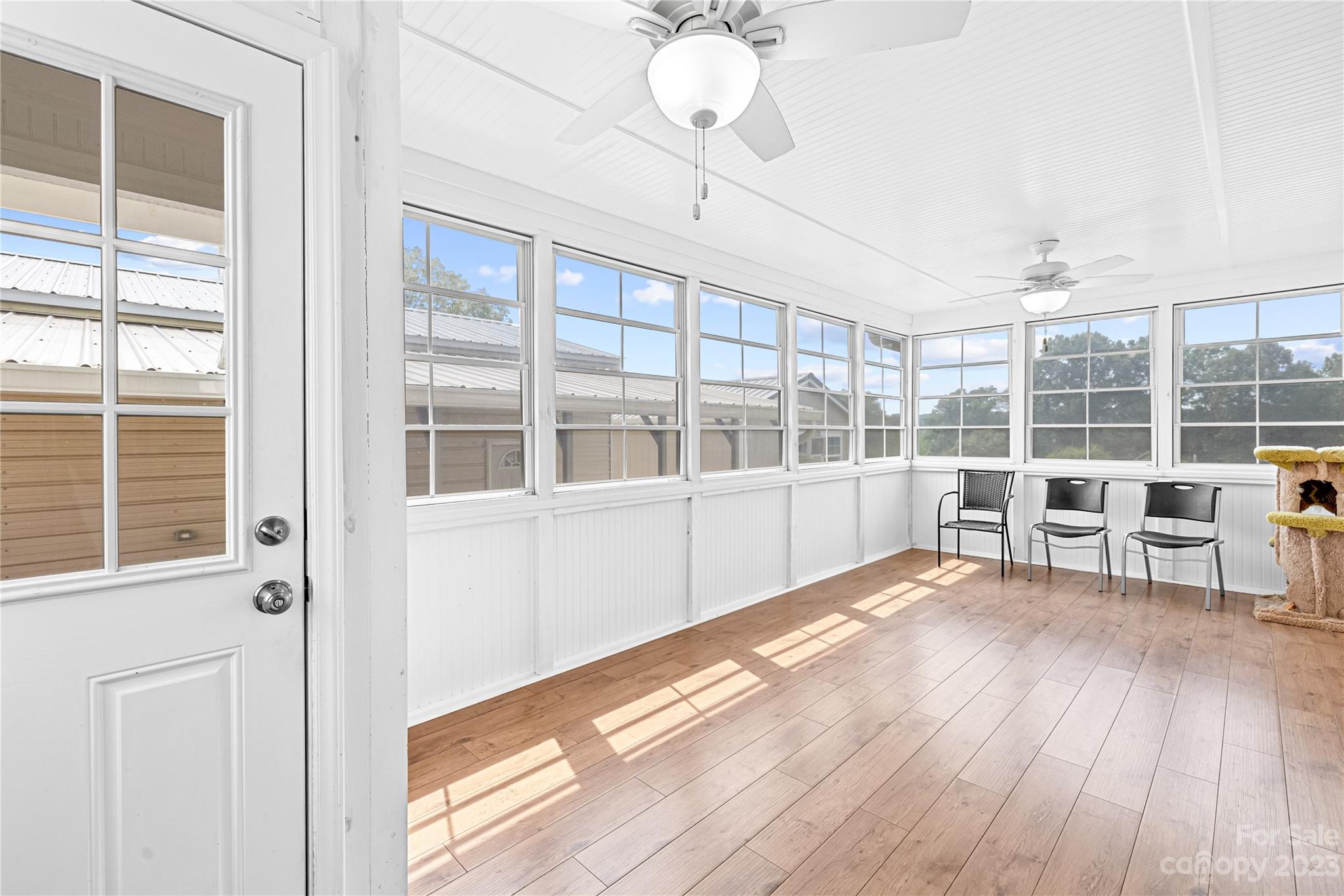 1131 Sikes Mill Road Monroe, NC 28110 - Photo 40 of 43 a view of a room with wooden floor and windows