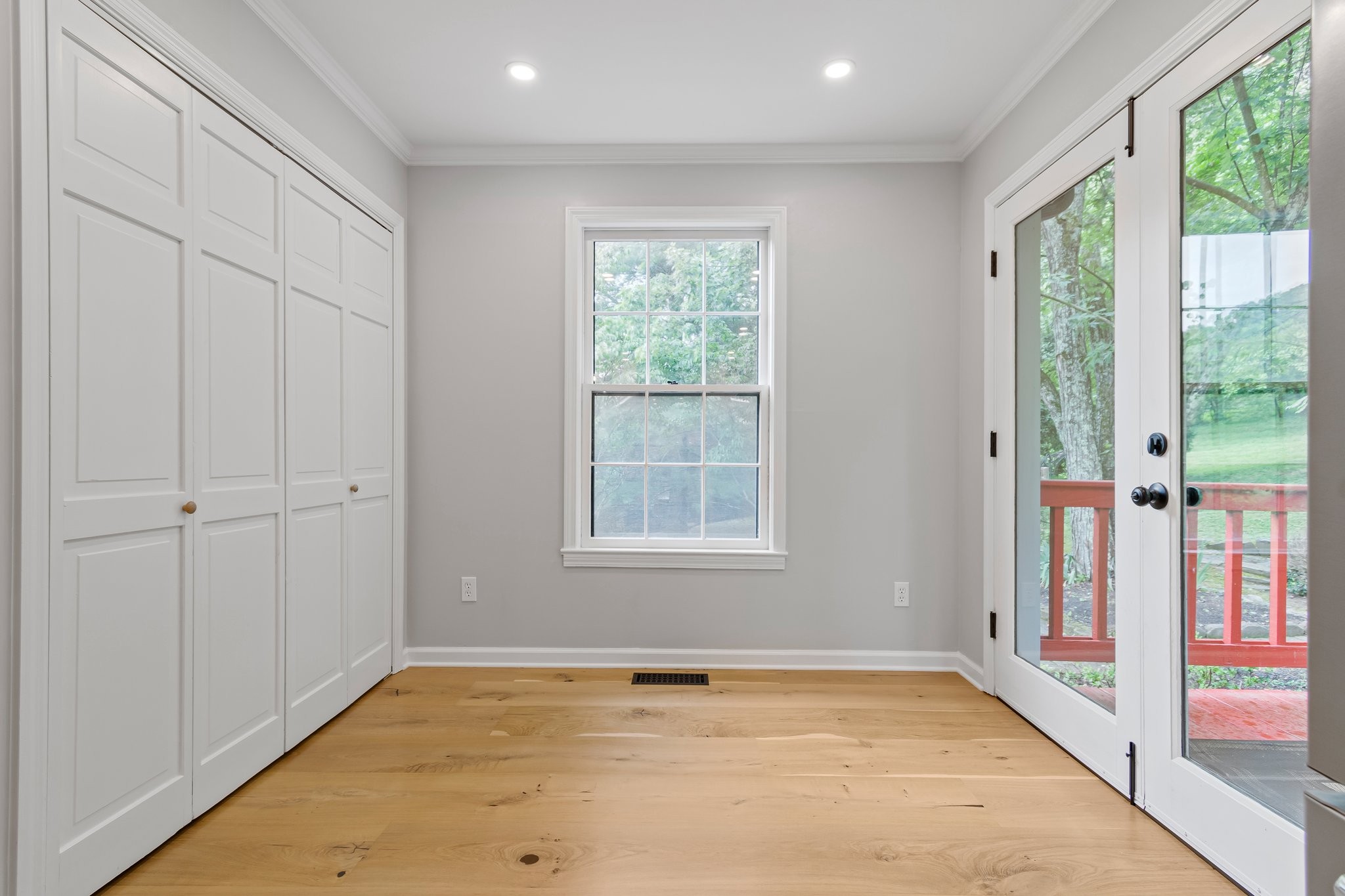 1111 Deer Lake Road Franklin, TN 37069 - Photo 28 of 53 a view of an empty room with wooden floor and a window
