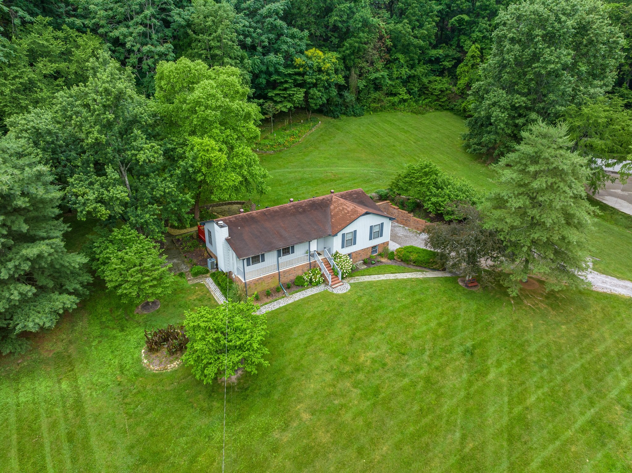 1111 Deer Lake Road Franklin, TN 37069 - Photo 45 of 53 a view of a house with a yard
