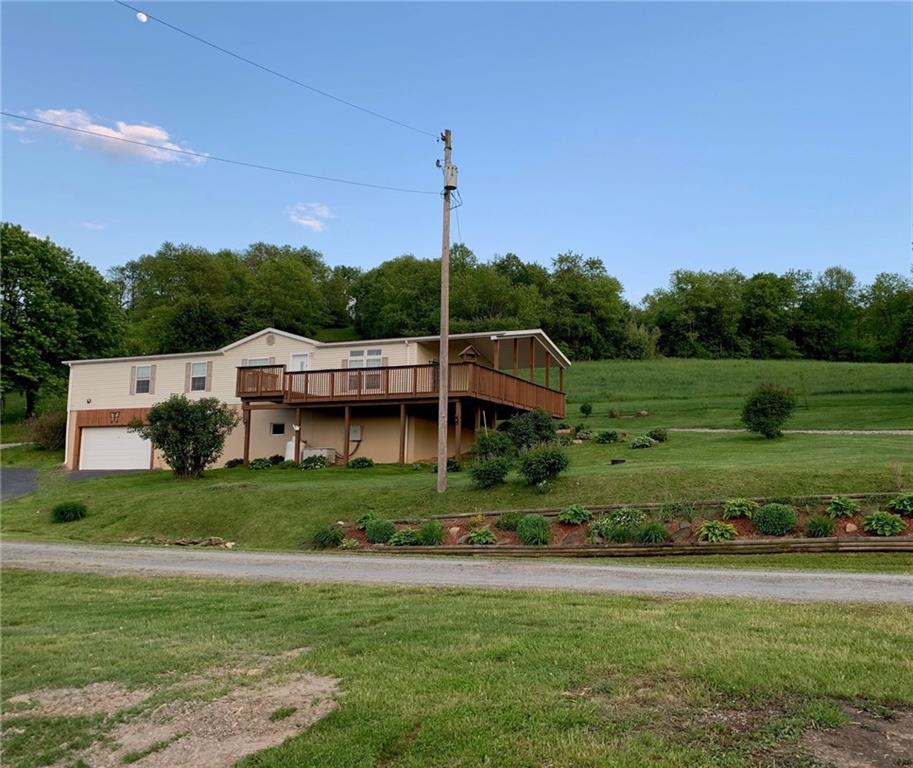 52 Willow Road Claysville, PA 15323 - Photo 2 of 25 Another view of this beautiful home if you are standing at the detached garage. Large landscaped yard with lots of grass to play in!