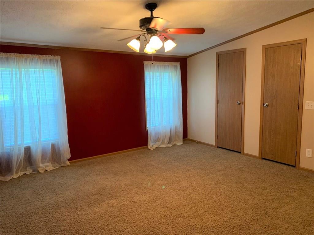 52 Willow Road Claysville, PA 15323 - Photo 11 of 25 This is the spacious master bedroom with 2 closets straight ahead and a large walk in closet off to the right. The master bath is also off to the right.