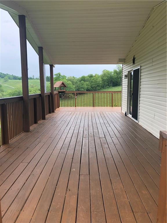 52 Willow Road Claysville, PA 15323 - Photo 18 of 25 A view of the side deck, it's gorgeous isn't it!! That slider accesses the living room. The views out here are amazing!
