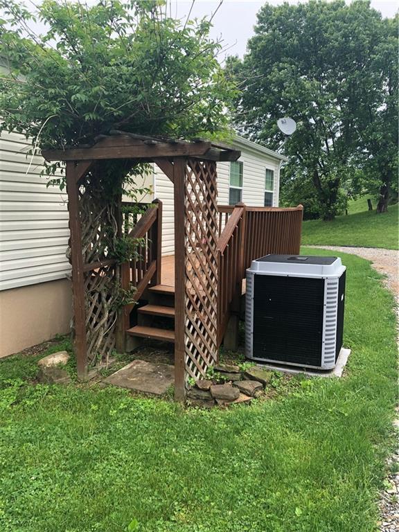 52 Willow Road Claysville, PA 15323 - Photo 19 of 25 This is the back little deck which accesses the laundry room.