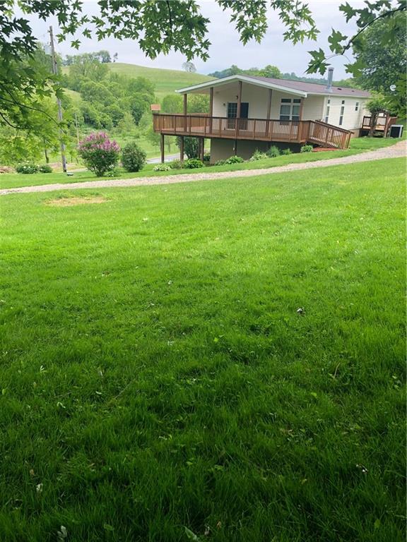 52 Willow Road Claysville, PA 15323 - Photo 21 of 25 Another view of the yard and the side deck, you can also see there are no homes close to you, look at the view!