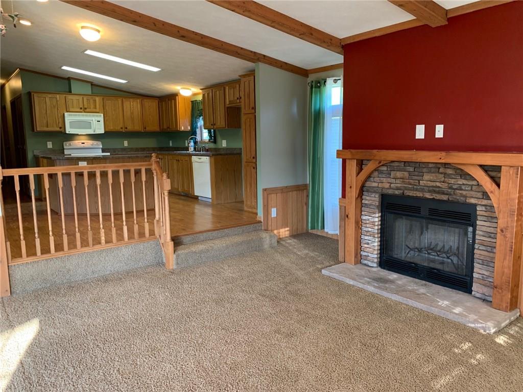 52 Willow Road Claysville, PA 15323 - Photo 4 of 25 This shows the flow from the living room to the kitchen, fantastic if you are entertaining, plenty of room to move. And a closer view of the beautiful fireplace.