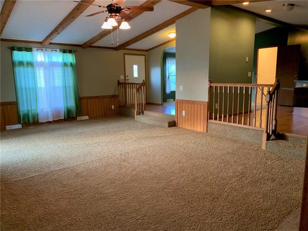52 Willow Road Claysville, PA 15323 - Photo 6 of 25 If you are standing in the corner by the fireplace you can see the front door straight ahead which has access to the deck, the kitchen is to the right and the dining room is on the other side of the front door. This home has so much main living space!