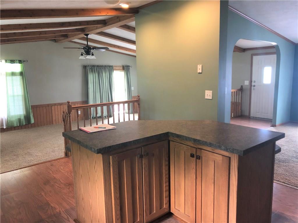 52 Willow Road Claysville, PA 15323 - Photo 8 of 25 If you are standing in the corner of the kitchen the dining room is off to the right and the sunken living room is off to the left, this gives you a nice feel for how the ceilings look too!