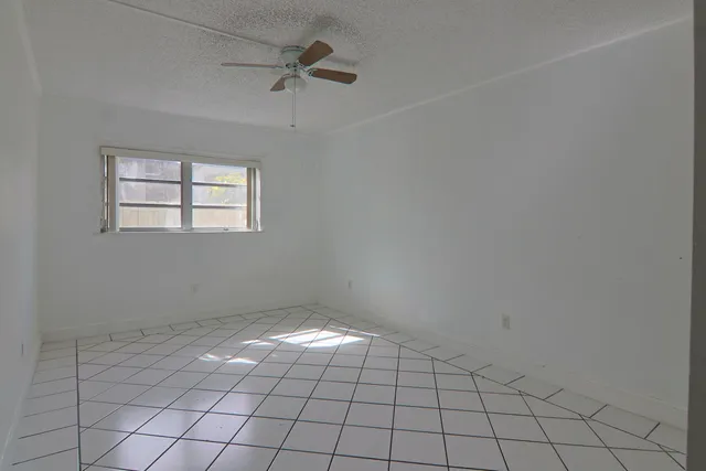 a view of an empty room with window