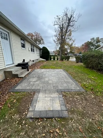 a view of a back yard of the house