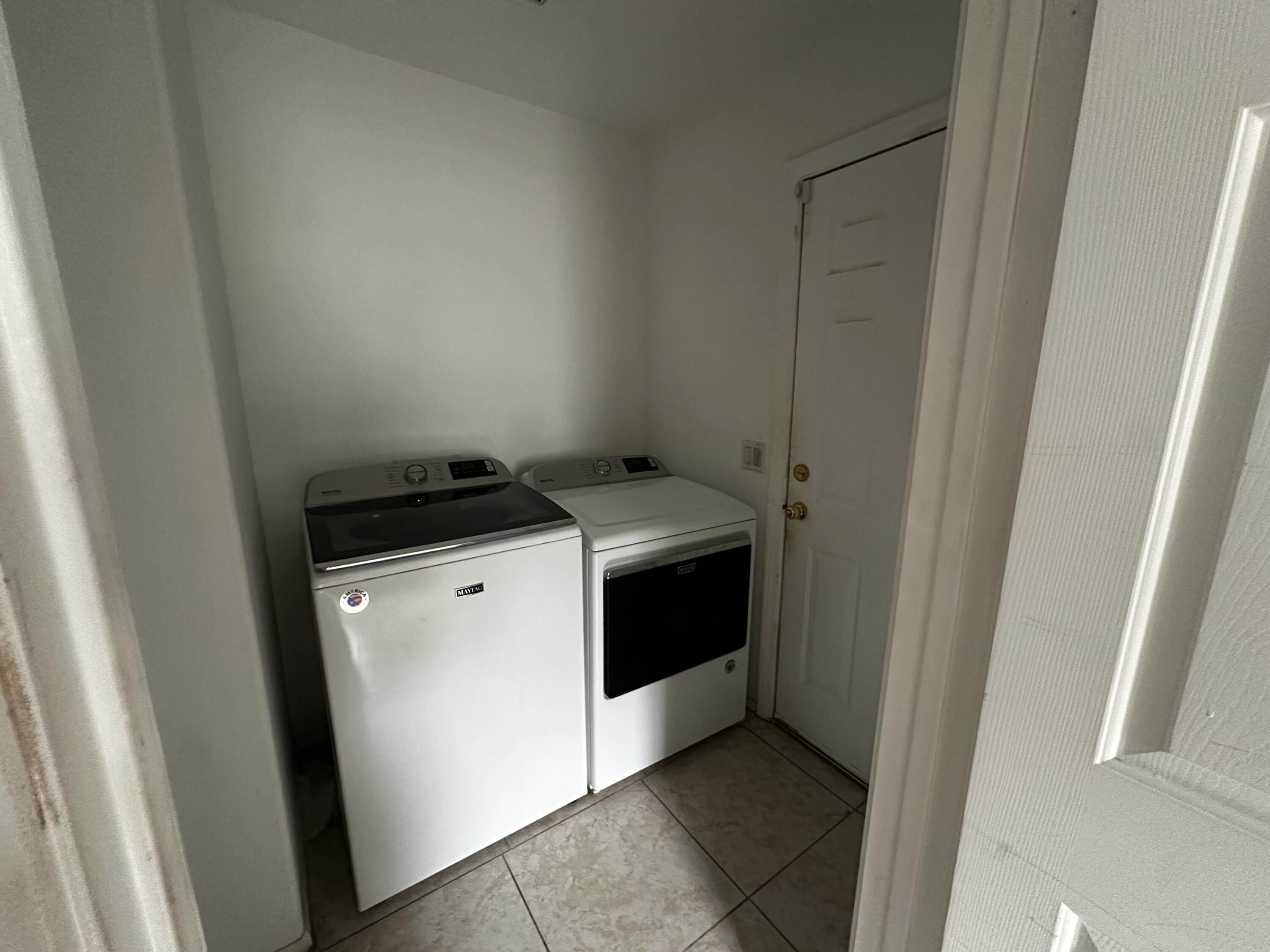 31675 Victor Road Cathedral City, CA 92234 - Photo 16 of 17 a utility room with washer and dryer