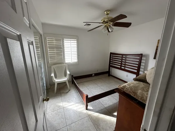 a room with furniture and a window