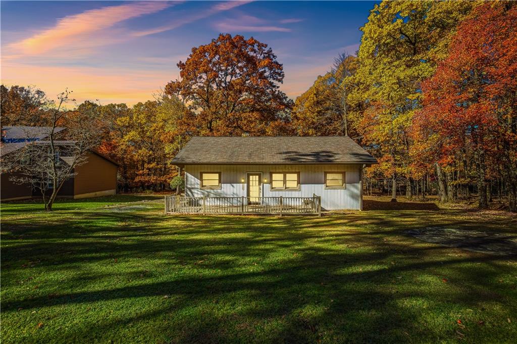 112 Chestnut Ridge Road Acme, PA 15610 - Photo 3 of 31 a front view of a house with a garden