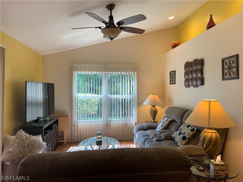 17560 Lee Road Fort Myers, FL 33967 - Photo 14 of 34 a living room with furniture and a window
