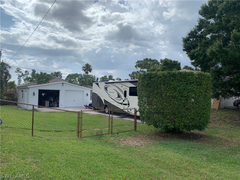 17560 Lee Road Fort Myers, FL 33967 - Photo 30 of 34 a view of a house with a backyard