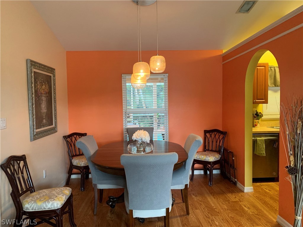 17560 Lee Road Fort Myers, FL 33967 - Photo 6 of 34 a dining room with furniture and window