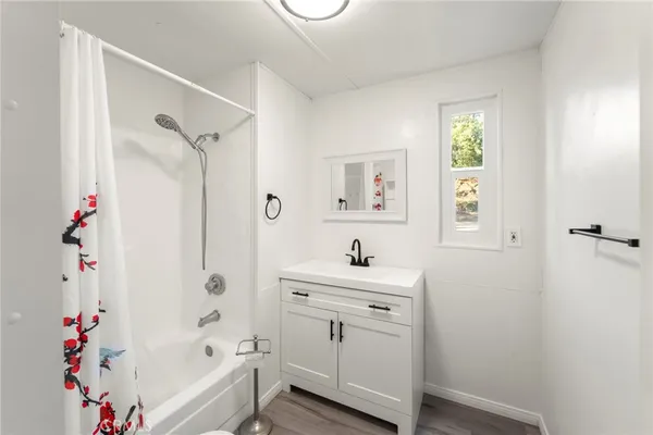 a view of a bathroom from the hallway