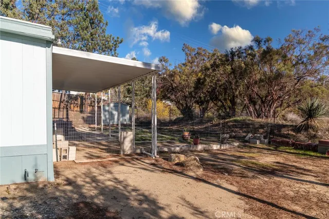 a view of residential houses with outdoor space