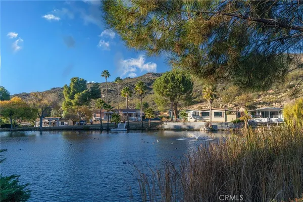 a view of a street with a yard
