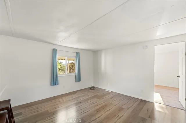 a kitchen with stainless steel appliances a refrigerator and a stove