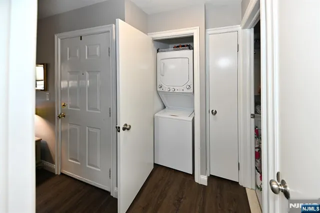 a view of a bathroom with a glass door shower and a mirror