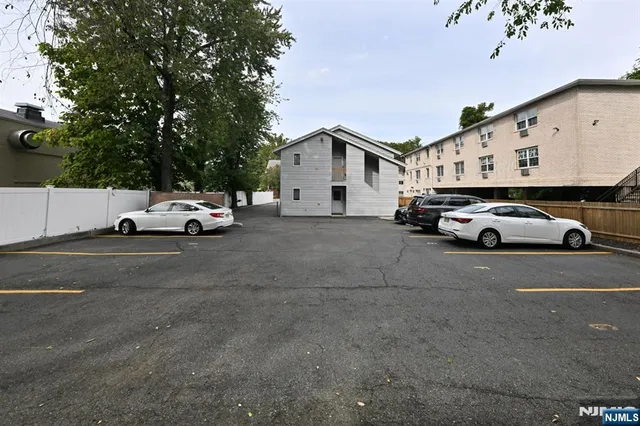 a car parked in front of a house