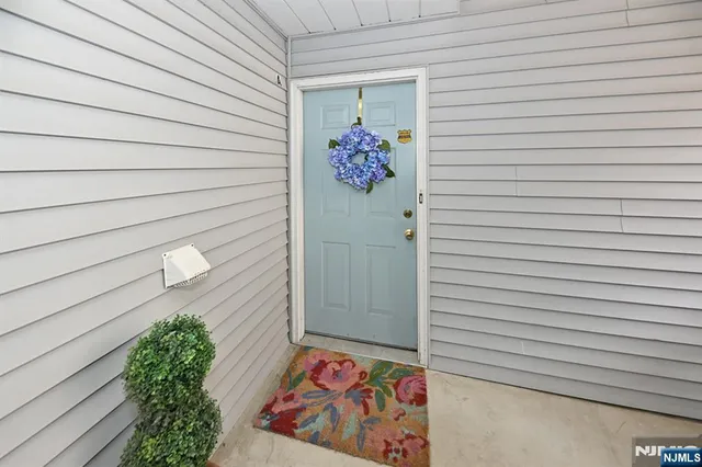 a view of door and bedroom