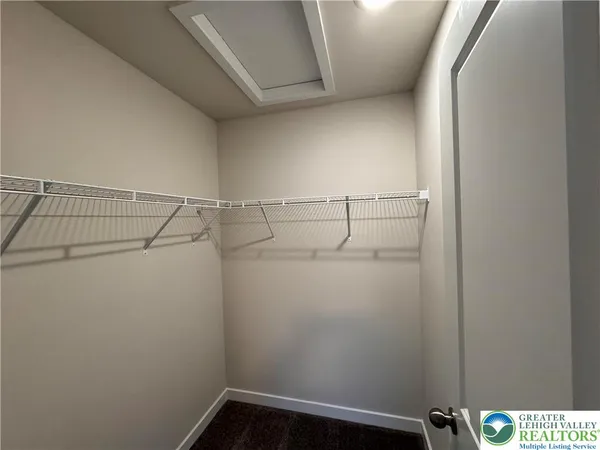 a view of a room with racks on the wall