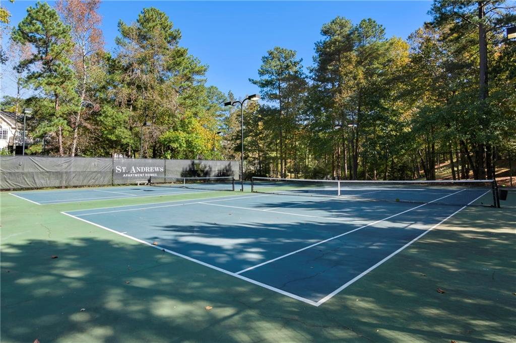 10055 Jones Bridge Road, Unit 206 Johns Creek, GA 30022 - Photo 28 of 28 a view of tennis court