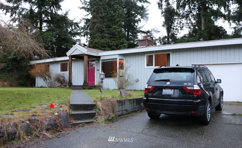 24015 4th Place West Bothell, WA 98021 - Photo 1 of 14 a car parked in front of a house
