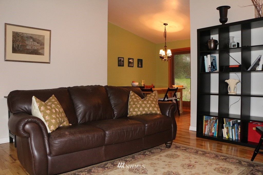 24015 4th Place West Bothell, WA 98021 - Photo 2 of 14 a living room with furniture and a book shelf