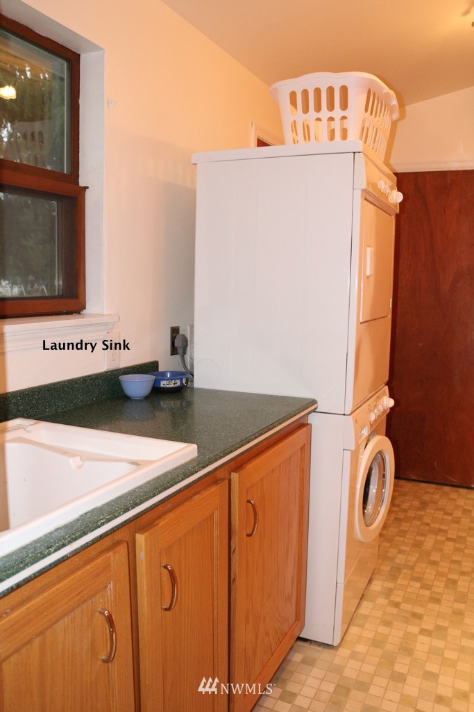 24015 4th Place West Bothell, WA 98021 - Photo 11 of 14 a utility room with dryer and washer