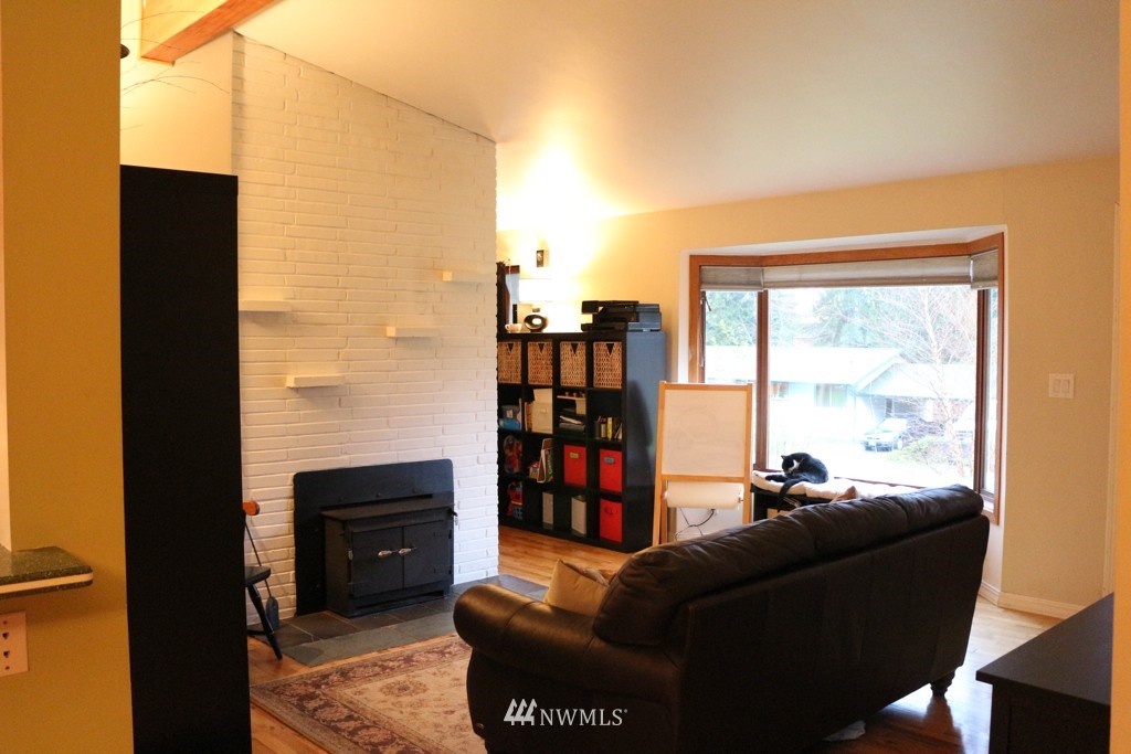 24015 4th Place West Bothell, WA 98021 - Photo 3 of 14 a living room with furniture a rug and a window