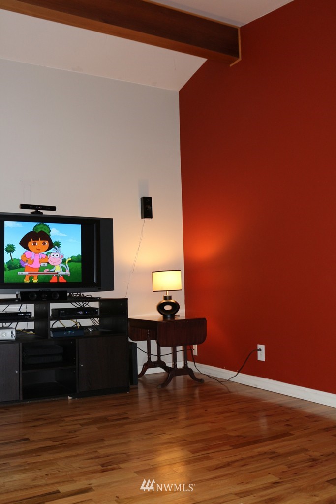 24015 4th Place West Bothell, WA 98021 - Photo 4 of 14 a living room with furniture and a flat screen tv