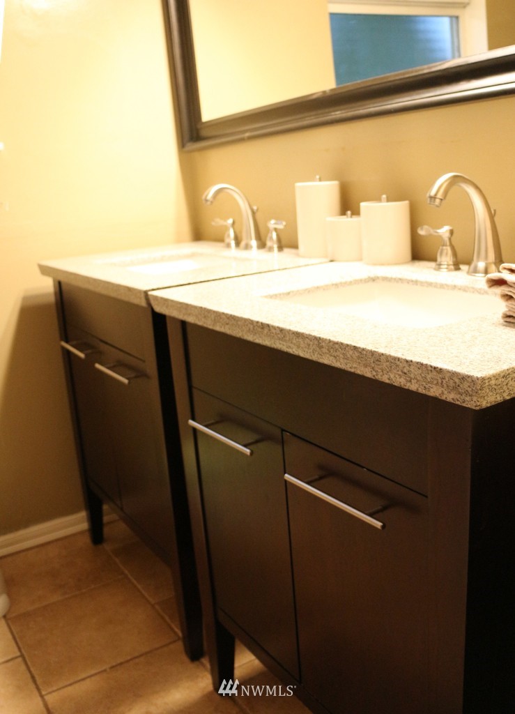 24015 4th Place West Bothell, WA 98021 - Photo 10 of 14 a bathroom with a sink vanity and a mirror