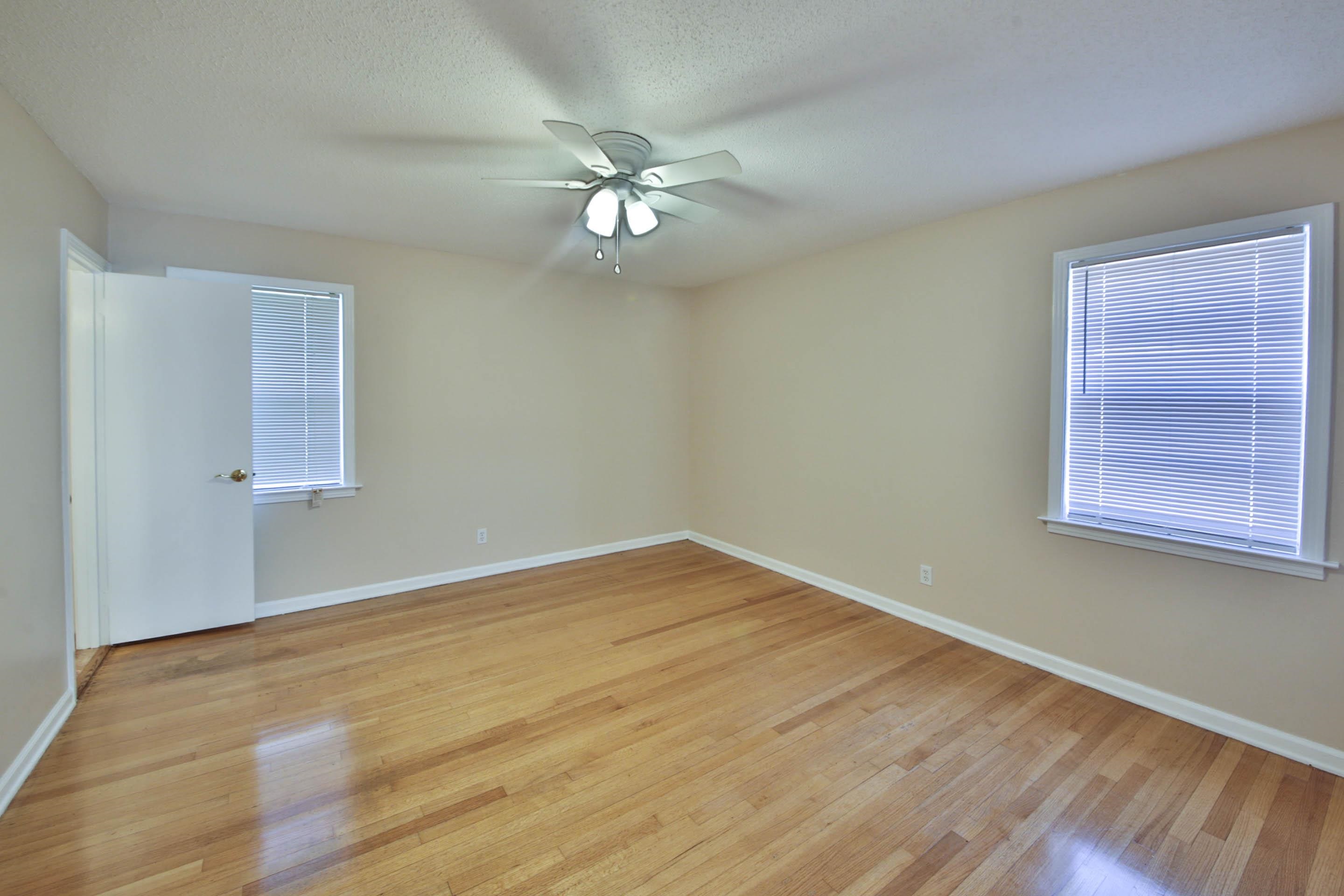 1820 West Holmes Road Memphis, TN 38109 - Photo 26 of 28 Unfurnished room with light wood-type flooring, ceiling fan, and a textured ceiling