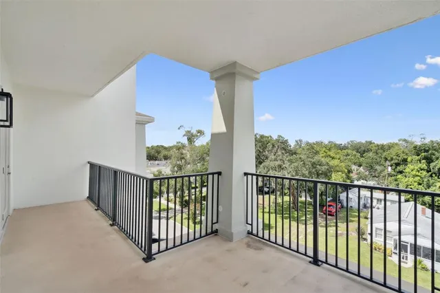 a view of a balcony with an outdoor space