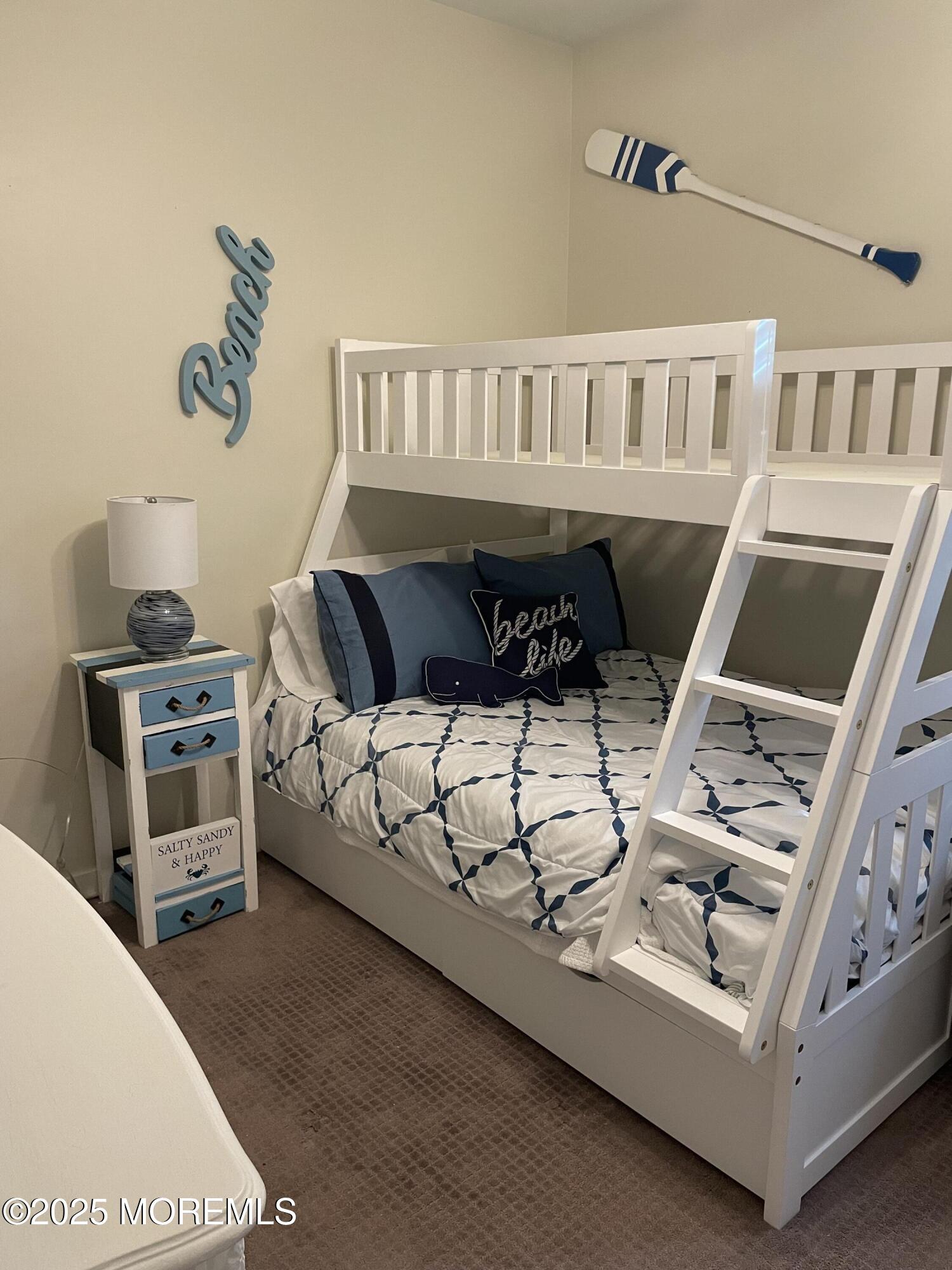 239 Beach Front, Unit 1 Manasquan, NJ 08736 - Photo 21 of 31 a view of living room with furniture and a window