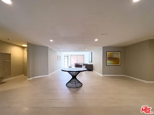 a room with furniture and a window