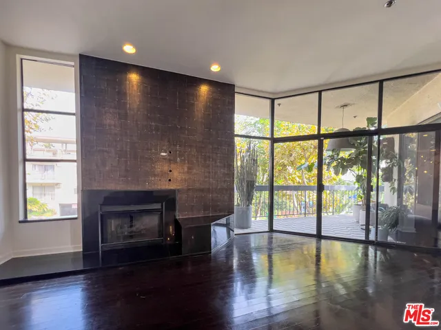 a kitchen with a stove oven and sink