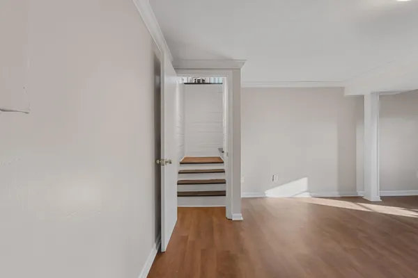 a view of wooden floor in an empty room