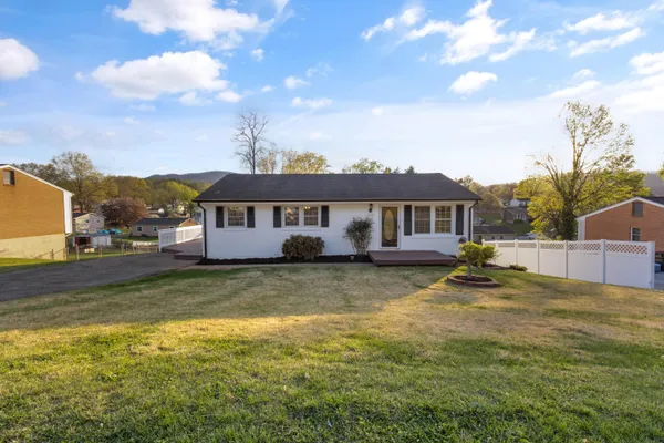 a view of a house with a big yard