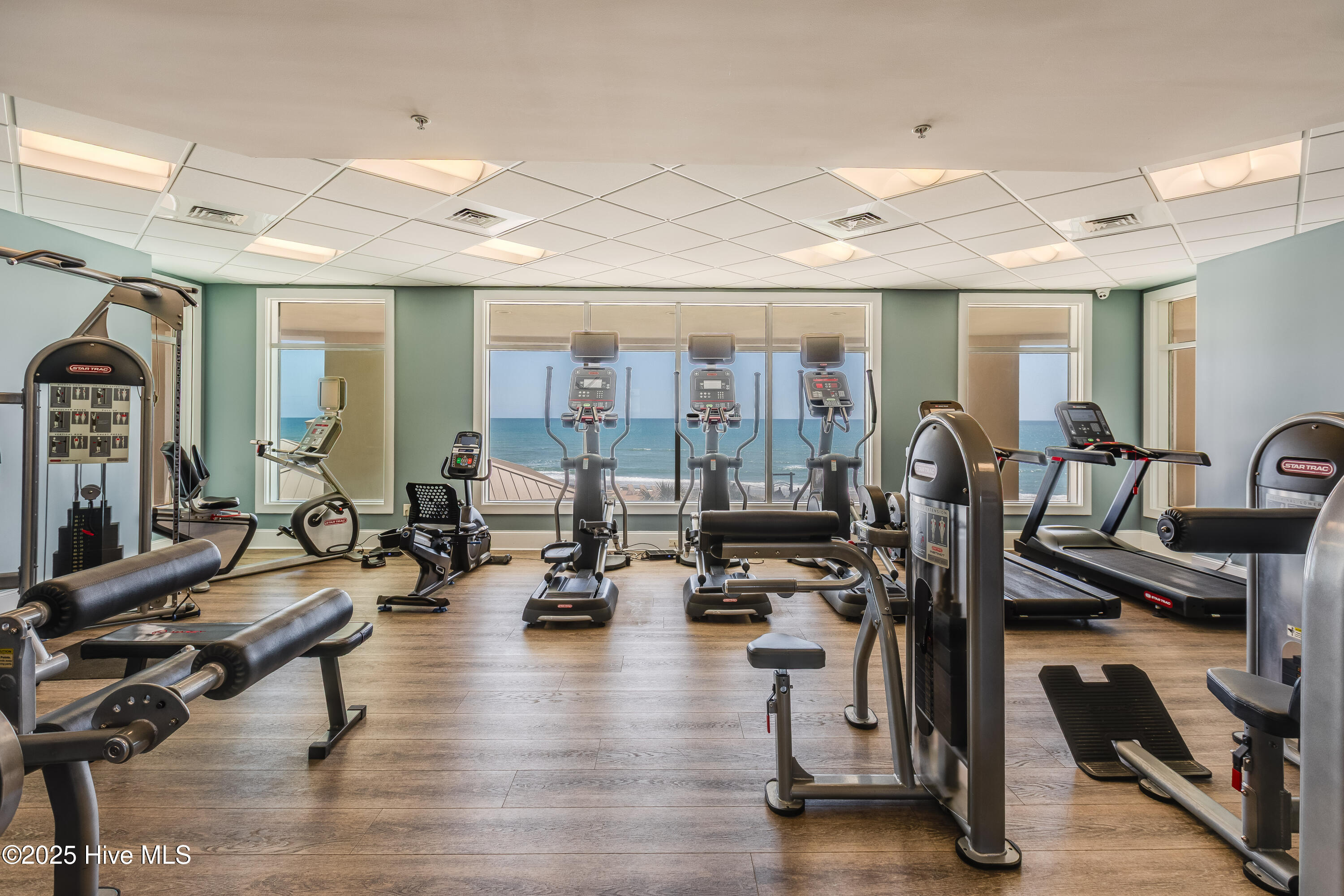 1435 Salter Path Road, Unit C1 Indian Beach, NC 28512 - Photo 29 of 47 Grande Villas at the Preserve boasts an amenity package that will have you thinking you are on vacation everyday! The amazing poolside setting, with the Atlantic Ocean as a back drop, creates a feeling of glamour. The lounges and oceanside terrace provide beautiful spaces to relax with friends and family or take in the breathtaking sunrises and sunsets. Included with the monthly HOA is a game room, club room, fitness center with an OCEANFRONT view, a pool/beach towel service for owners, planned social activities, a dog park, 2 electric vehicle charging stations, and a fire pit. Water, sewer, cable and internet are also included. Specific only to first floor units, you'll love and appreciate the perk of having exterior steps to the outside from your private, oceanside balcony. You'll be at the pool or on the beach in a snap! Check out the photos and then COME SEE why Grande Villas is a FAVORITE among all. Rental history is available upon request.