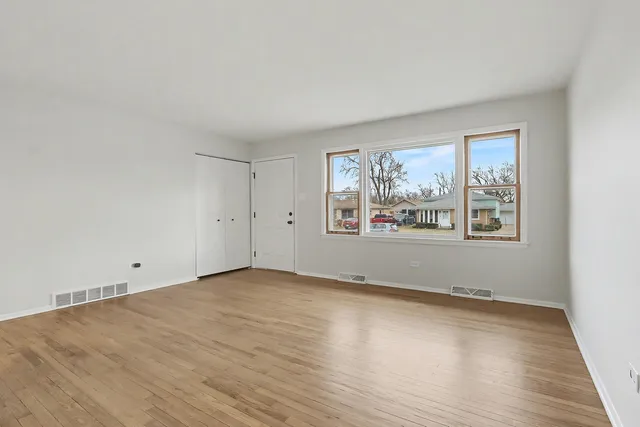 an empty room with window