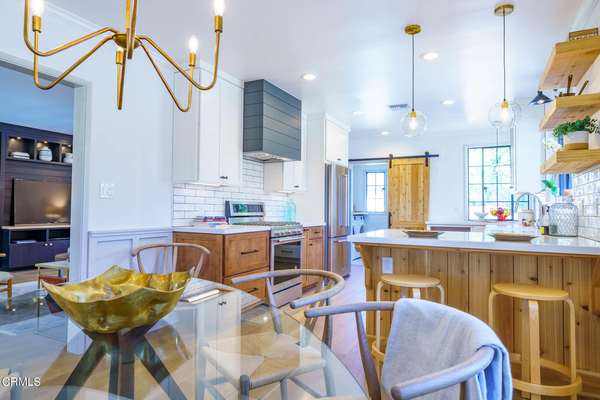 2709 Deodar Circle Pasadena, CA 91107 - Photo 14 of 43 a kitchen with cabinets a sink and chairs in it
