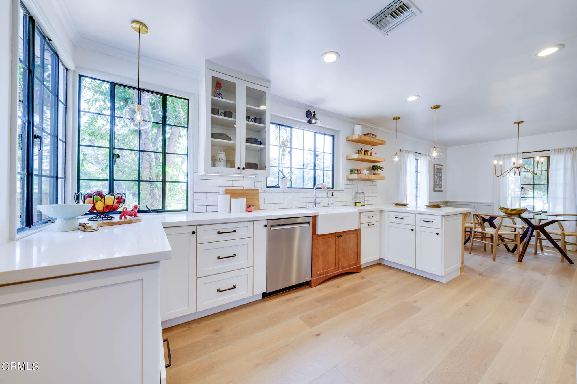 2709 Deodar Circle Pasadena, CA 91107 - Photo 17 of 43 a kitchen that has a lot of cabinets in it and wooden floors